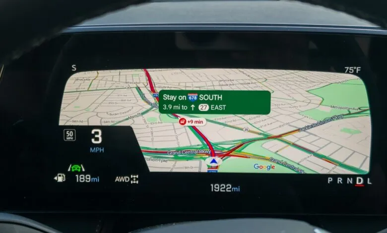 Close-up of a car's digital dashboard displaying navigation with a map and driving information.