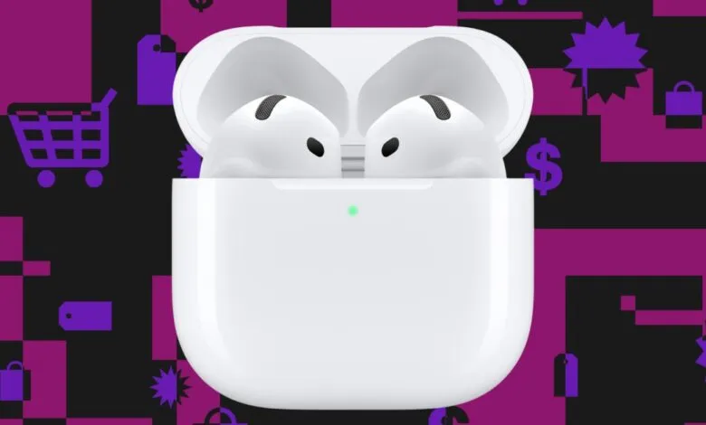 White Apple AirPods Pro earbuds in their charging case with a green indicator light.