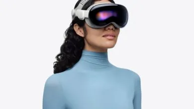 Woman wearing Apple Vision Pro headset with a blue turtleneck