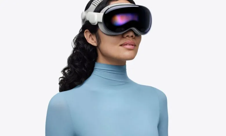 Woman wearing Apple Vision Pro headset with a blue turtleneck