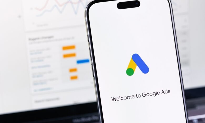 Close-up of a smartphone displaying the Google Ads logo and welcome message.