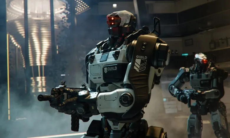 Close-up of a futuristic combat robot with red glowing eyes and a rifle.
