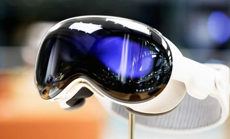 Close-up of the Apple Vision Pro headset, showing its sleek design and reflective display.