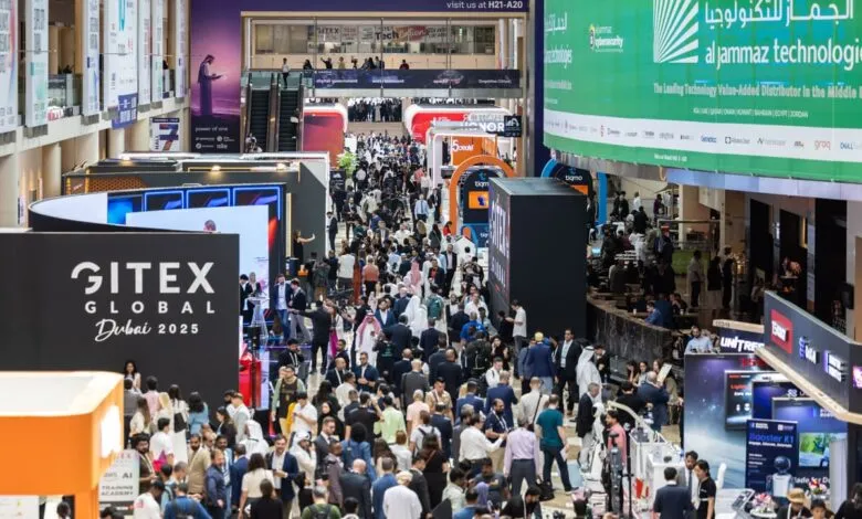 Crowded exhibition hall with attendees and booths at GITEX GLOBAL Dubai 2025.