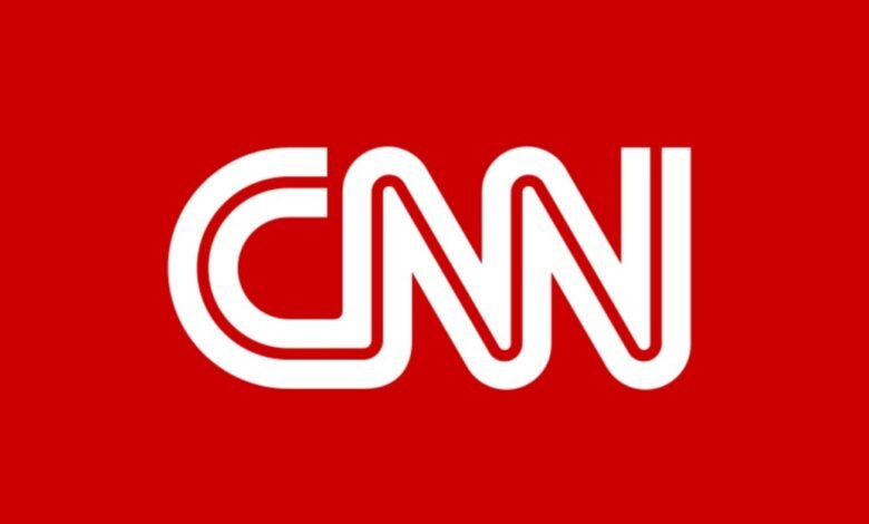 The white CNN logo is displayed prominently on a solid red background.