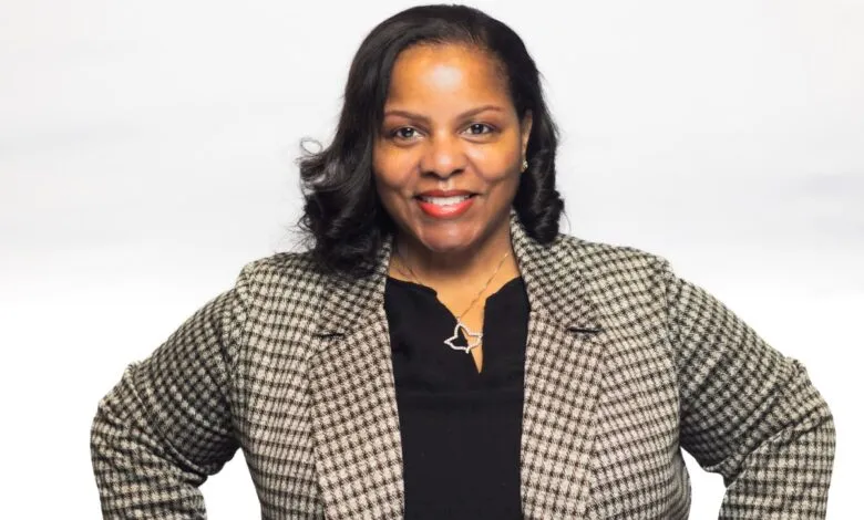 Portrait of SaLisa Berrien, founder of COI Energy, smiling confidently.