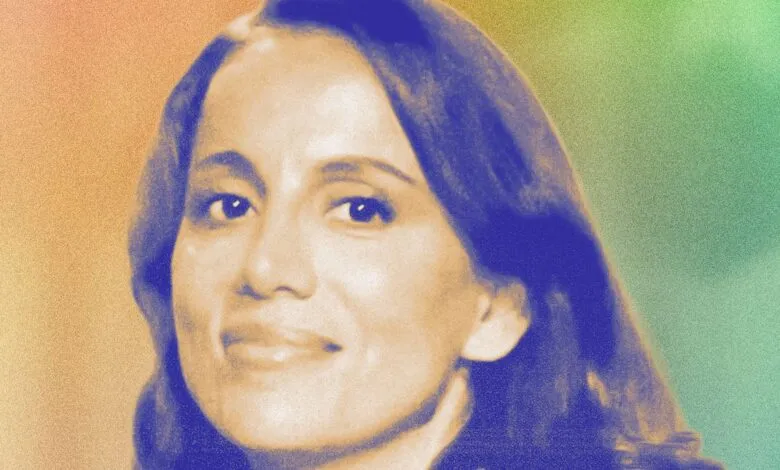 Close-up portrait of Mira Murati with a colorful, grainy background.