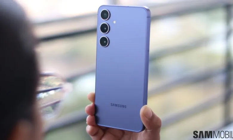 Close-up of a person holding a purple Samsung Galaxy S24 Plus smartphone.