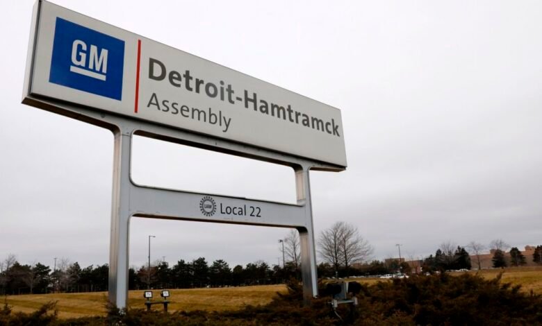 Sign for General Motors Detroit-Hamtramck Assembly plant with UAW Local 22 logo.