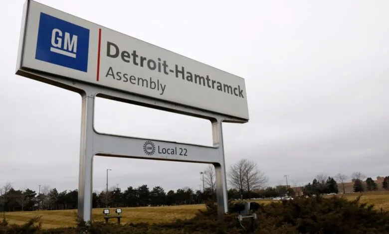 Sign for General Motors Detroit-Hamtramck Assembly plant with UAW Local 22 logo.