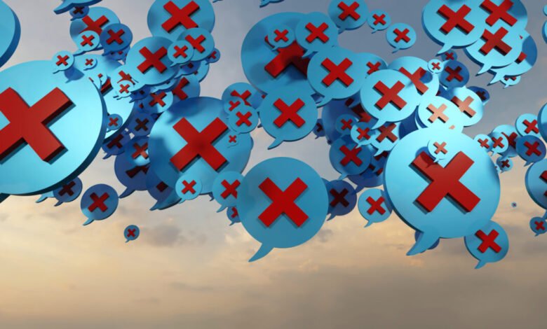 A swarm of blue speech bubbles with red 'X' marks against a cloudy sky.