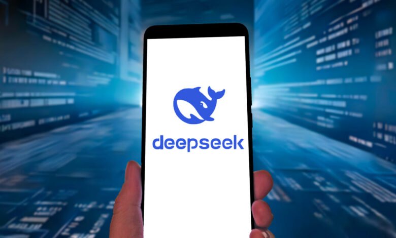 A hand holds a smartphone displaying the DeepSeek logo against a digital background.