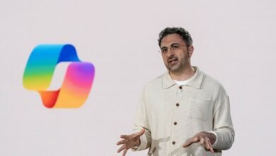 Man in a cream shirt speaking next to a colorful Instagram logo