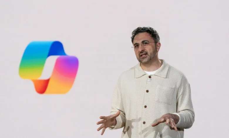 Man in a cream shirt speaking next to a colorful Instagram logo