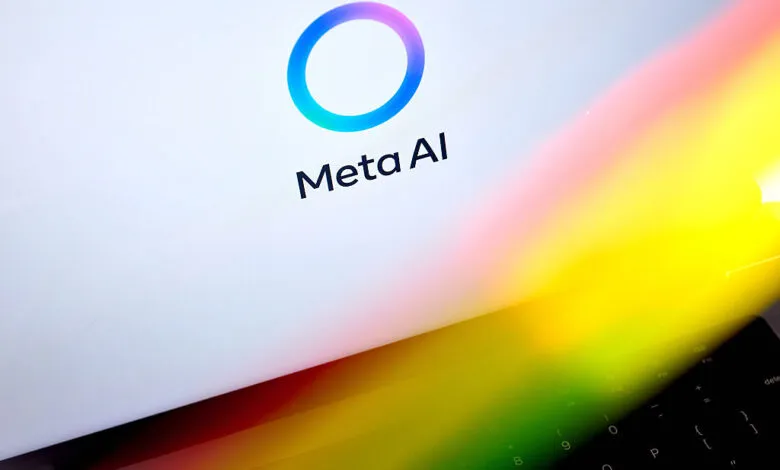 Meta AI logo displayed on a laptop screen with a colorful light reflection.