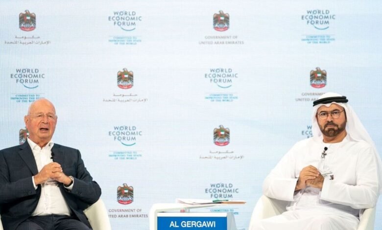 Klaus Schwab and Al Gergawi seated on stage at the World Economic Forum.