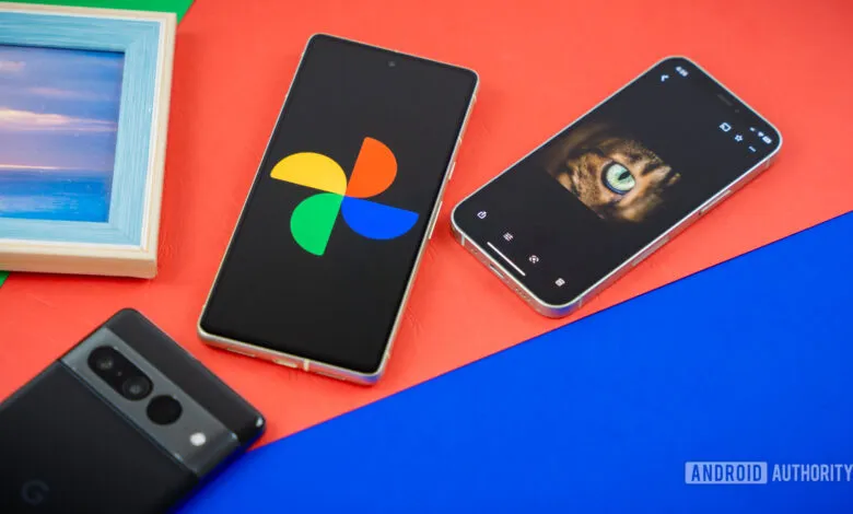 Three smartphones and a picture frame arranged on a colorful background.