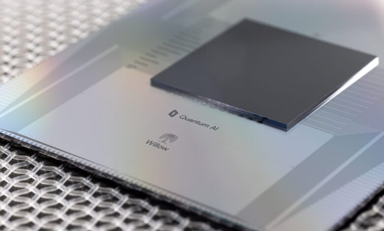 Close-up of Google's Quantum AI Willow chip on a textured surface.
