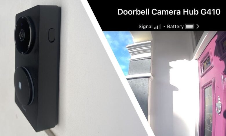 Close-up of a black doorbell camera and its view of a purple front door.