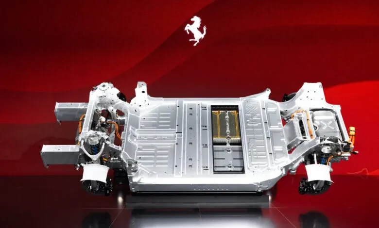 Ferrari electric vehicle chassis with battery pack and suspension components.