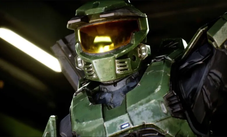 Close-up of Master Chief's iconic green armor and golden visor.