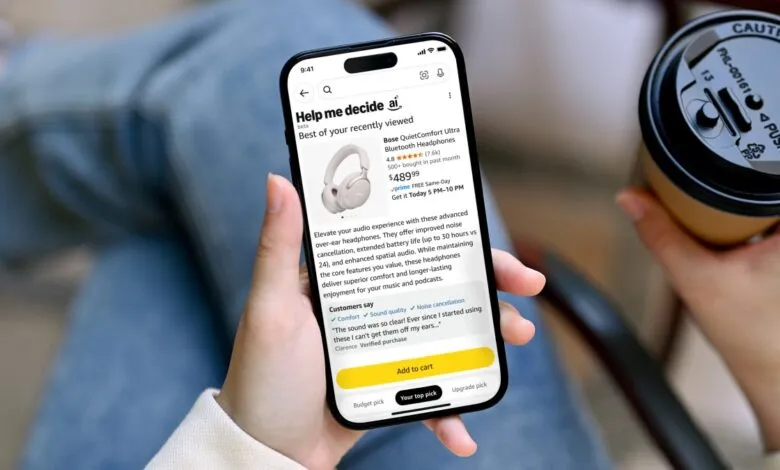 Person holding a smartphone displaying Bose QuietComfort Ultra headphones on Amazon.