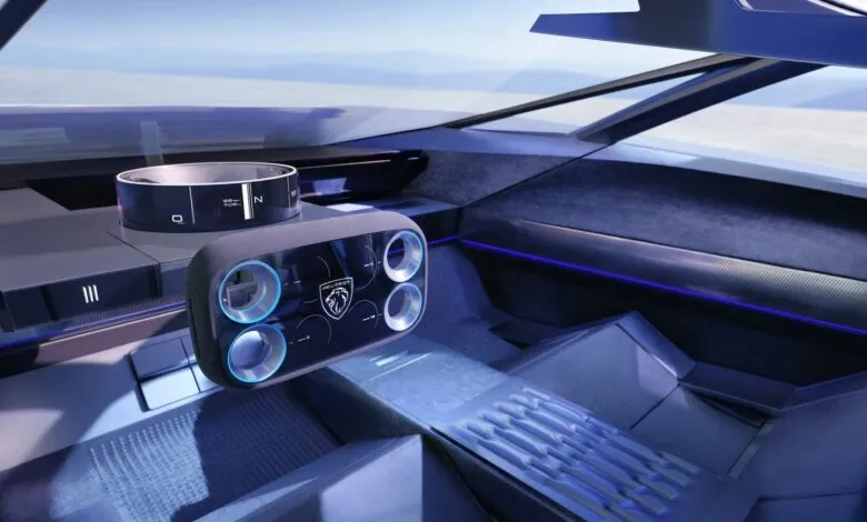 Futuristic car interior with digital displays and ambient blue lighting.
