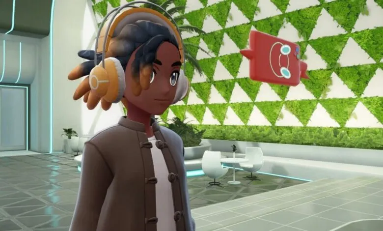 A young person with headphones looks at a floating red creature in a futuristic room.