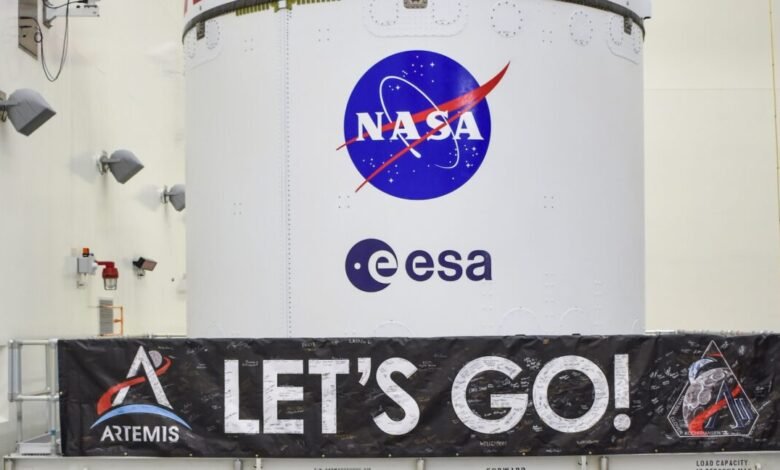 NASA Artemis II Orion spacecraft with NASA and ESA logos, and a 'Let's Go!' banner.