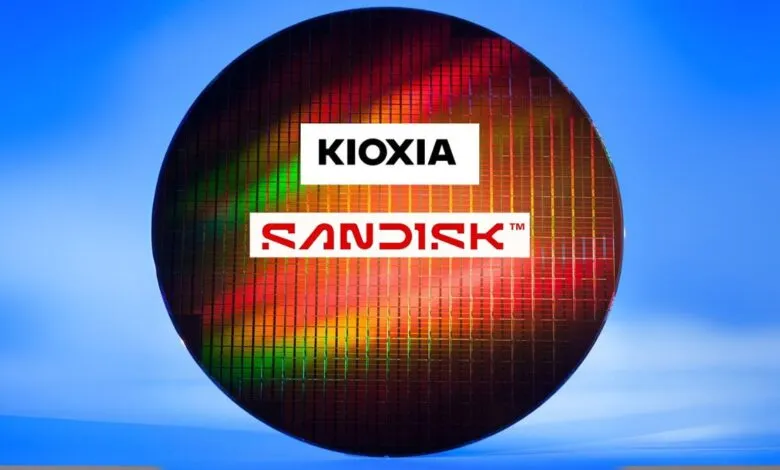A silicon wafer with Kioxia and Sandisk logos displayed.