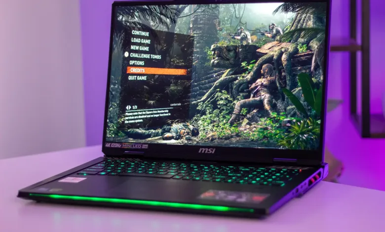 MSI gaming laptop displaying a jungle-themed video game menu with green backlit keyboard.