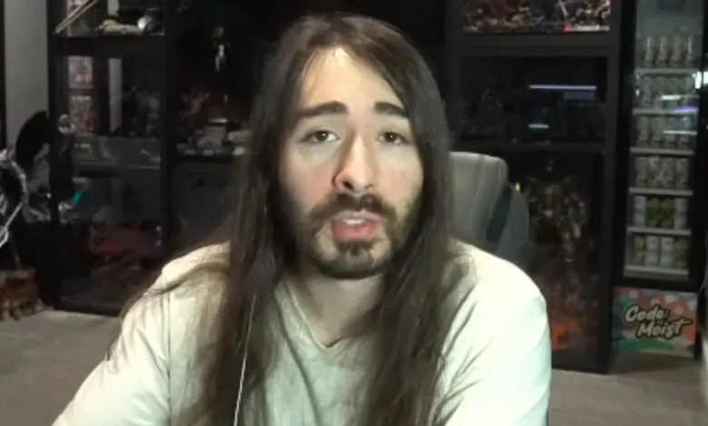 MoistCr1TiKaL speaking directly to the camera in his streaming room.