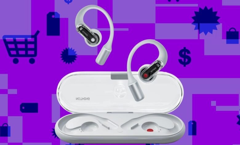 White Nothing Ear (stick) wireless earbuds with charging case on a purple background with shopping icons.
