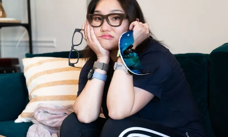 Woman with glasses and sunglasses looking bored on a couch