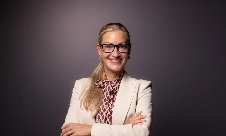 Professional portrait of Petra Schirren, President Gulf at Ericsson, wearing glasses and a cream blazer.