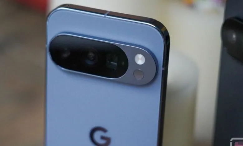 Close-up of the rear camera module of a light blue Google Pixel smartphone.