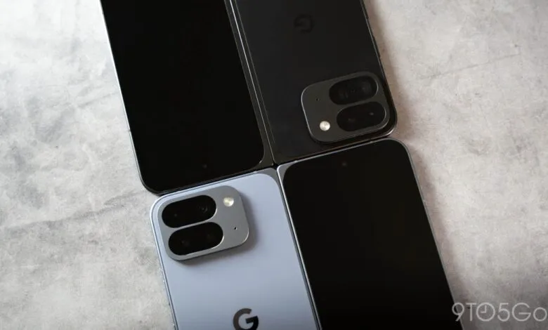 Two Google Pixel foldable phones, one light blue and one black, are arranged diagonally.
