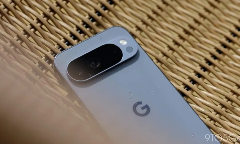 Close-up of a Google Pixel phone's camera bar with water droplets.