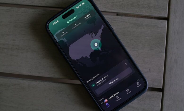 iPhone displaying ProtonVPN app with a map of the US and connection status.