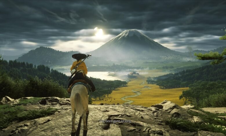 A lone samurai on horseback gazes at a vast, misty landscape with a prominent mountain.