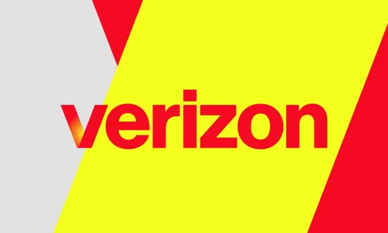 The Verizon logo in red text on a bright yellow background with red and gray geometric shapes.