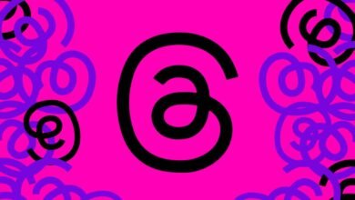 Abstract design with a large black symbol resembling an 'a' or a stylized '6' on a vibrant pink background, surrounded by purple and black swirls.
