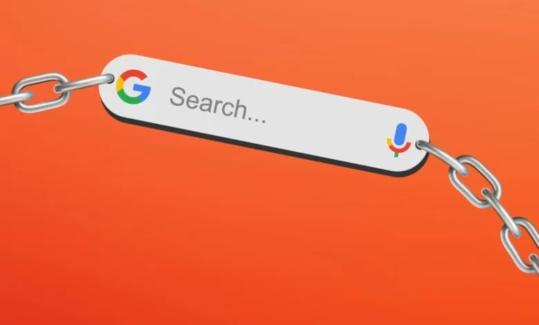 Google search bar connected by a metal chain on an orange background