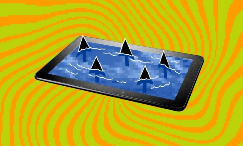 Tablet screen displaying shark fins in blue water against a vibrant orange and green background.