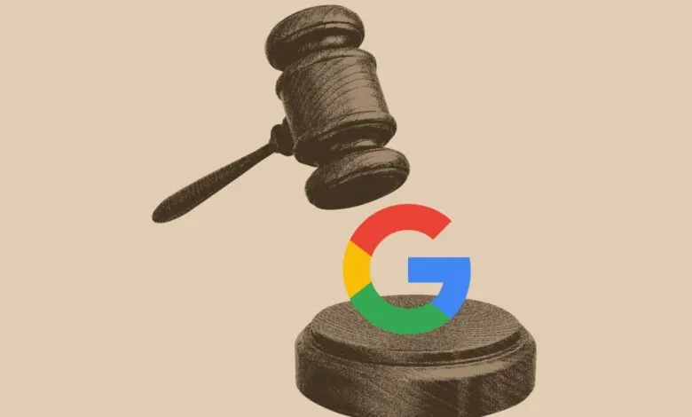A gavel poised over the Google logo on a wooden block.