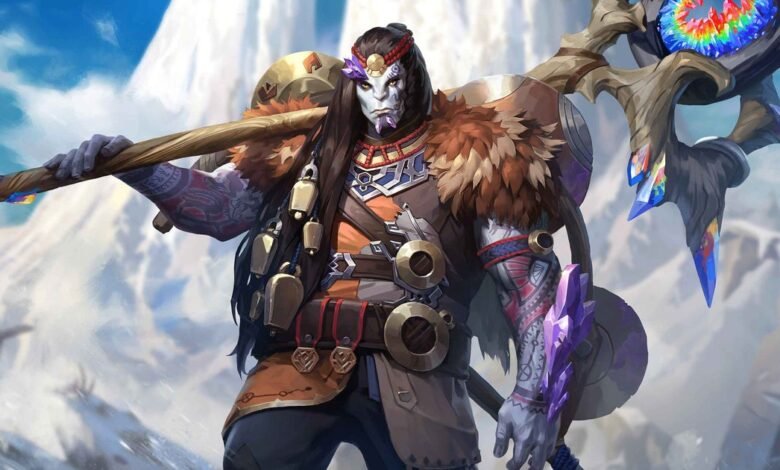 A fantasy character with grey skin, long black hair, and tribal markings holds a staff adorned with crystals.