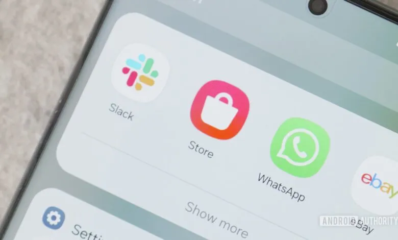 Close-up of a smartphone screen showing app icons for Slack, Store, WhatsApp, and eBay.