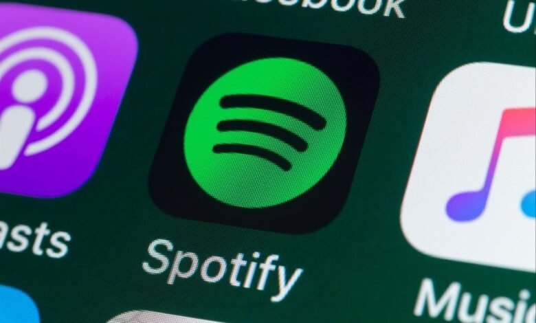 Close-up of the Spotify app icon on a smartphone screen.