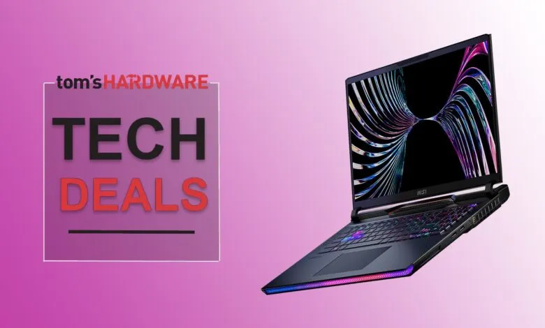 MSI gaming laptop with RGB lighting and abstract wallpaper, next to Tom's Hardware Tech Deals logo.