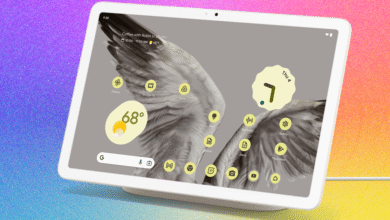 A white smart display with a colorful, textured background.